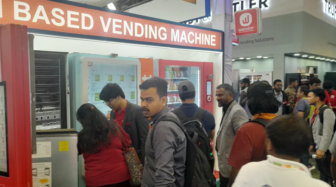 Three modern vending machine types side by side showing their capacities
