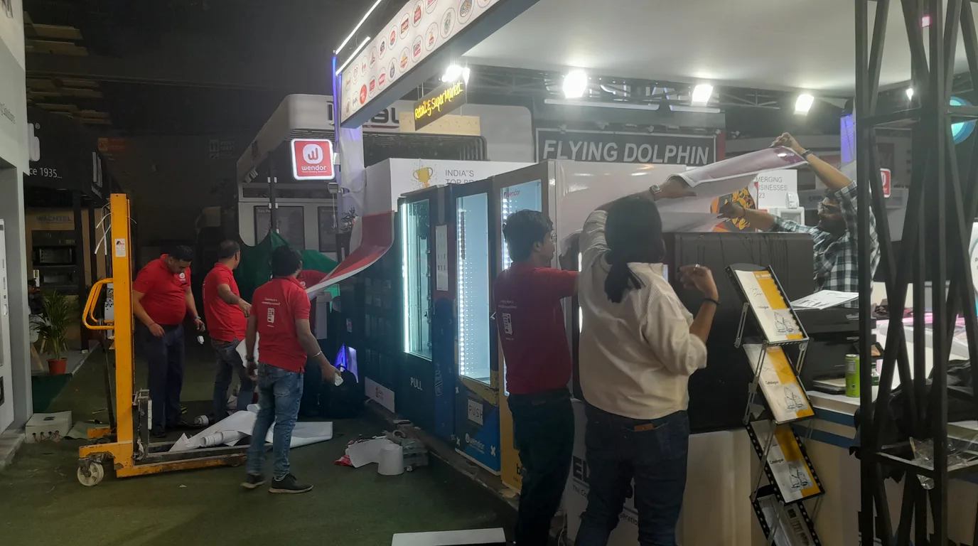 Premium vending machine kiosk in a modern shopping mall corridor